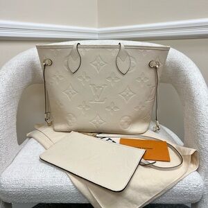 Louis Vuitton Neverfull MM Empreinte leather color cream
